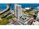 Aerial view of a modern highrise building with pool and waterfront access at 331 Cleveland St # 1102, Clearwater, FL 33755