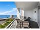 Spacious balcony with table and chairs overlooking the bay at 331 Cleveland St # 1102, Clearwater, FL 33755