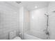 Bathroom with white subway tile and bathtub at 331 Cleveland St # 1102, Clearwater, FL 33755