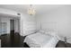 Well-lit bedroom with built-in shelving and hardwood floors at 331 Cleveland St # 1102, Clearwater, FL 33755