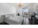 Bright bedroom with a king-size bed and access to balcony at 331 Cleveland St # 1102, Clearwater, FL 33755