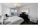 Spacious bedroom with a king-size bed and water view at 331 Cleveland St # 1102, Clearwater, FL 33755