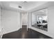 Modern hallway with glass wall and view into dining area at 331 Cleveland St # 1102, Clearwater, FL 33755