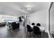 Modern kitchen with black cabinetry and breakfast bar at 331 Cleveland St # 1102, Clearwater, FL 33755