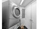 Laundry room with stackable washer and dryer at 331 Cleveland St # 1102, Clearwater, FL 33755