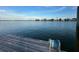 Wooden dock with water view and ladder at 341 E Madeira Ave, Madeira Beach, FL 33708