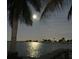 Tranquil waterfront view at night with full moon at 341 E Madeira Ave, Madeira Beach, FL 33708