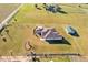 Aerial view of house and outbuildings at 36511 Frazee Hill Rd, Dade City, FL 33523