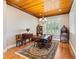 Formal dining room with hardwood floors and wood accents at 36511 Frazee Hill Rd, Dade City, FL 33523