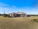 One-story home with large yard and partial view of landscape at 36511 Frazee Hill Rd, Dade City, FL 33523