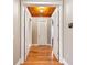 Elegant hallway with wood flooring and neutral colored walls at 36511 Frazee Hill Rd, Dade City, FL 33523