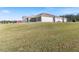 House exterior showcasing side yard at 36511 Frazee Hill Rd, Dade City, FL 33523