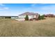 House exterior showcasing the back with a large yard at 36511 Frazee Hill Rd, Dade City, FL 33523