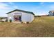 Large storage building with roll-up door at 36511 Frazee Hill Rd, Dade City, FL 33523