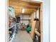Well-lit workshop with ample shelving and storage at 36511 Frazee Hill Rd, Dade City, FL 33523