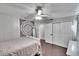 Bedroom with double door closet and ceiling fan at 4101 Concord Way, Plant City, FL 33566