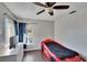 Bedroom with ceiling fan, window, and car bed at 4101 Concord Way, Plant City, FL 33566