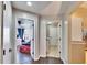 Hallway with views into bedroom and laundry room at 4101 Concord Way, Plant City, FL 33566