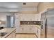 Modern kitchen with white cabinets, granite countertops, and stainless steel appliances at 4101 Concord Way, Plant City, FL 33566
