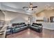 Open living room and kitchen, hardwood floors, and a ceiling fan at 4101 Concord Way, Plant City, FL 33566