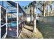 View of the backyard pool area and surrounding landscape at 4101 Concord Way, Plant City, FL 33566