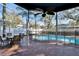 Enjoy this relaxing screened pool and patio area, complete with outdoor dining furniture at 4101 Concord Way, Plant City, FL 33566