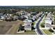 Aerial view of a neighborhood with various houses and streets at 4179 Bramblewood Loop, Spring Hill, FL 34609