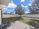 Fenced backyard with firepit and plenty of space for outdoor enjoyment at 4179 Bramblewood Loop, Spring Hill, FL 34609