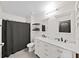 Bathroom with double vanity, marble countertop, and large mirror at 4179 Bramblewood Loop, Spring Hill, FL 34609