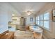 View of kitchen with stainless steel appliances and light cabinetry at 423 S Paula Dr # 203, Dunedin, FL 34698