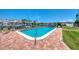 Refreshing community pool with water view at 423 S Paula Dr # 203, Dunedin, FL 34698