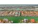 Aerial view of waterfront community with multiple buildings and boat slips at 443 Pinellas Bayway S # 104, St Petersburg, FL 33715