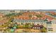 Wide aerial view of the community and waterfront at 443 Pinellas Bayway S # 104, St Petersburg, FL 33715