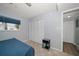 Well-lit bedroom with double doors to closet and bathroom at 4550 Overlook Ne Dr # 257, St Petersburg, FL 33703