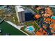 High-rise building and community pool, situated near a waterway at 4900 Brittany S Dr # 608, St Petersburg, FL 33715