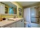 Bright bathroom with vanity, shower, and bathtub at 4900 Brittany S Dr # 608, St Petersburg, FL 33715