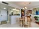 Elegant dining area showcasing a round table and chairs near kitchen at 4900 Brittany S Dr # 608, St Petersburg, FL 33715