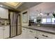 Modern kitchen with stainless steel appliances and white cabinets at 4900 Brittany S Dr # 608, St Petersburg, FL 33715