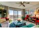 Relaxing living room featuring a comfy sofa, glass coffee table, and ocean view at 4900 Brittany S Dr # 608, St Petersburg, FL 33715