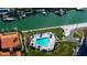 Community pool with surrounding lounge chairs and landscaping at 4900 Brittany S Dr # 608, St Petersburg, FL 33715