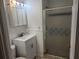 Clean bathroom with vanity, medicine cabinet, and shower at 5209 10Th S Ave, Gulfport, FL 33707