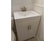 Modern bathroom vanity with white cabinet, sink, and silver faucet at 5209 10Th S Ave, Gulfport, FL 33707