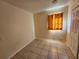 Neutral bedroom features tile floors and bright window at 5209 10Th S Ave, Gulfport, FL 33707