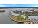 An aerial view showcasing a waterfront community, featuring a variety of buildings and landscaping at 5258 Beach Se Dr, St Petersburg, FL 33705