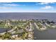 Aerial view of community, highlighting amenities like pool and tennis courts at 5258 Beach Se Dr, St Petersburg, FL 33705