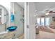 Updated bathroom with glass shower and modern blue sink at 5258 Beach Se Dr, St Petersburg, FL 33705