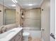 Clean bathroom, bathtub and shower combo at 5258 Beach Se Dr, St Petersburg, FL 33705