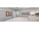 Guest bedroom with king-size bed and large artwork at 5258 Beach Se Dr, St Petersburg, FL 33705