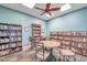 Community library with ample seating and bookshelves at 5258 Beach Se Dr, St Petersburg, FL 33705