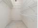 Large walk-in closet with wire shelving for ample storage at 5366 Hader Rd, North Port, FL 34288